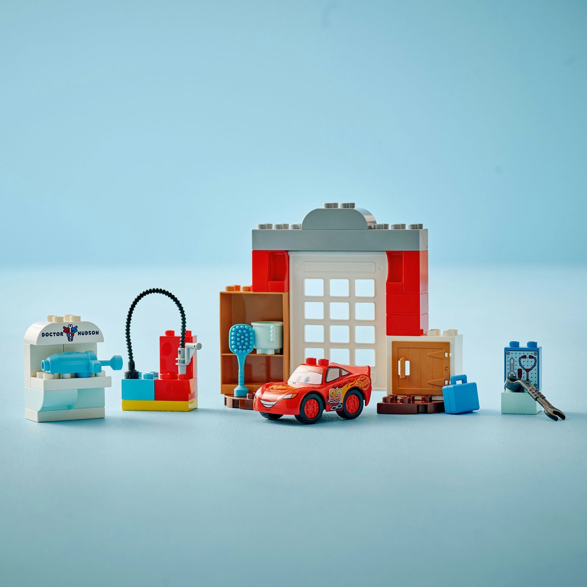 LEGO DUPLO VIZITA LUI MCQUEEN LA GARAJUL LUI DOC 10456 - imagine 6
